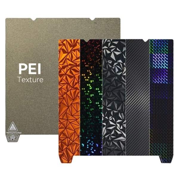A collection of textured PEI sheets in various colours including gold, orange, black, and a glittery green, arranged vertically with the text "PEI Texture" prominently displayed on the left.