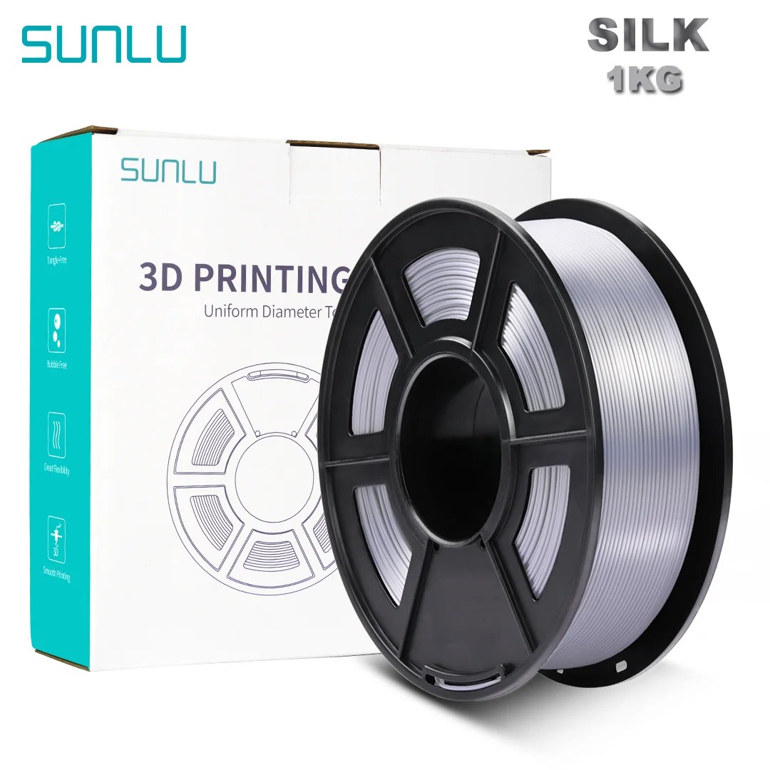 SUNLU 3D Printer Filament Silk Texture Feeling Silver 1kg Silky Rich Luster PLA Copper Silver SPLA filament 3d Printing Materials 1 A spool of SILK 3D printing filament, weighing 1KG, next to its packaging that features the brand name SUNLU and product details. The filament is shiny and silver in colour, and the box is predominantly white with teal accents.