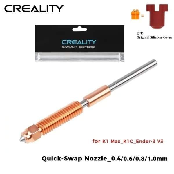 A copper and stainless steel quick-swap nozzle for 3D printers, with a hexagonal base and grooved body, displayed alongside its packaging and a promotional silicone cover gift.