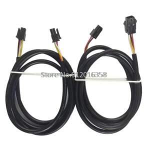 Two bundles of black electrical cables with connector ends, each secured with a white tie.