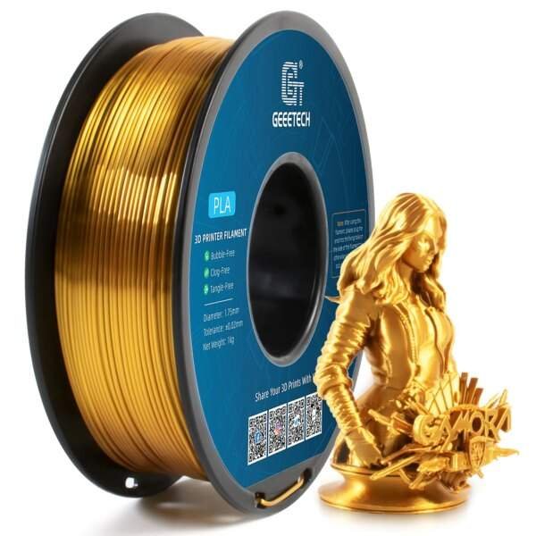A spool of gold PLA 3D printer filament next to a detailed golden figurine of a character, with the spool's label visible showing specifications and features.
