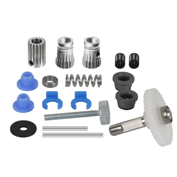 A collection of various mechanical components including metal gears, plastic bushings, a spring, washers, screws, and several small parts arranged on a white background.