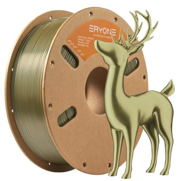 A spool of green 3D printer filament beside a small, shiny green deer figurine.